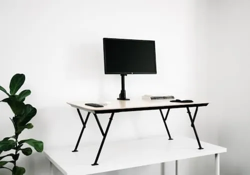 The Movi Standing Desk Converter - Sit Stand Desk Australia (Credit: The Movi)